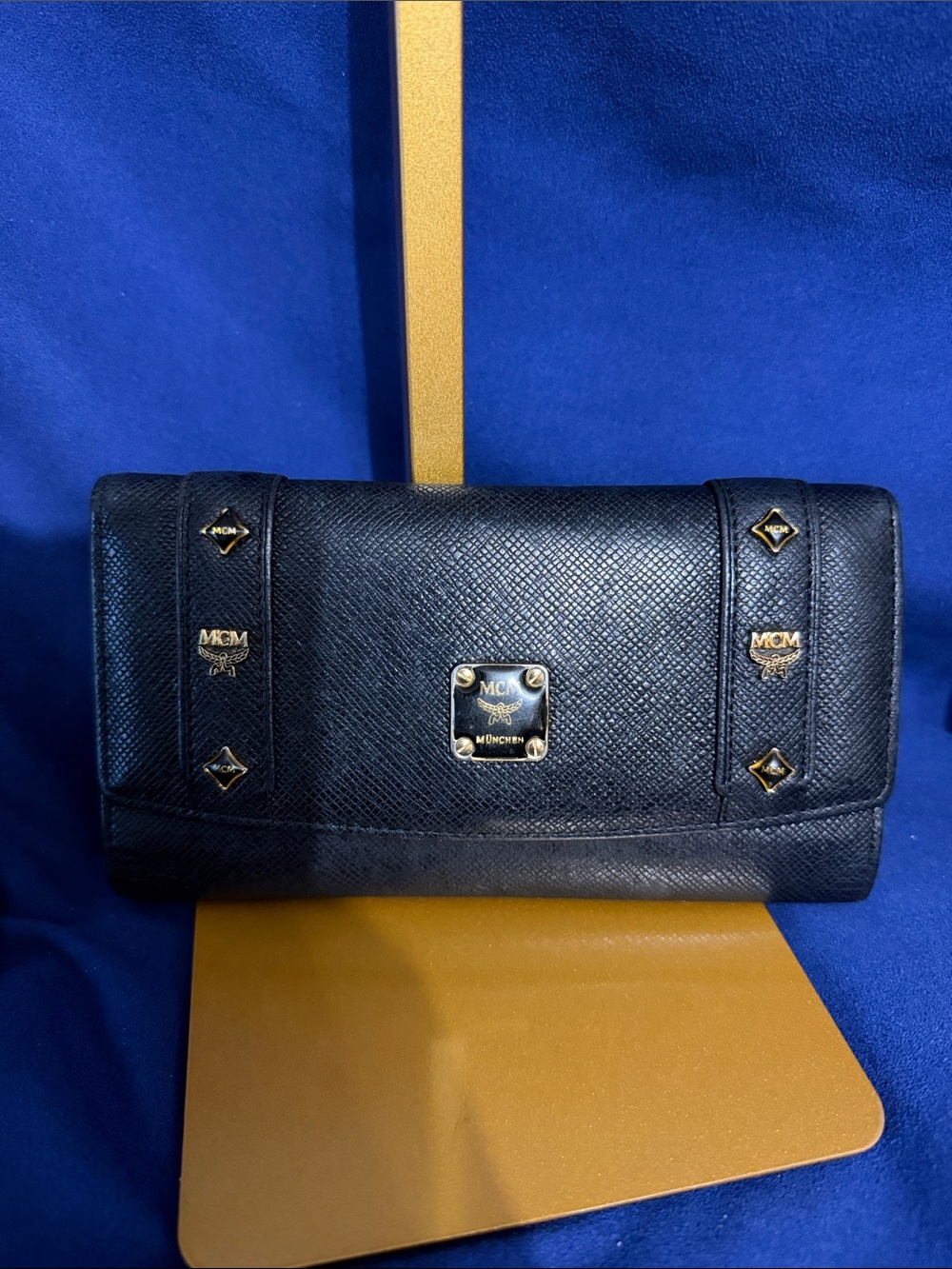 MCM Black Leather Continental Wallet with Gold Accents